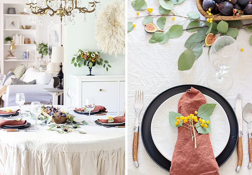 Mesa con mantel blanco y plato negro, creando un contraste elegante y minimalista en la decoración.