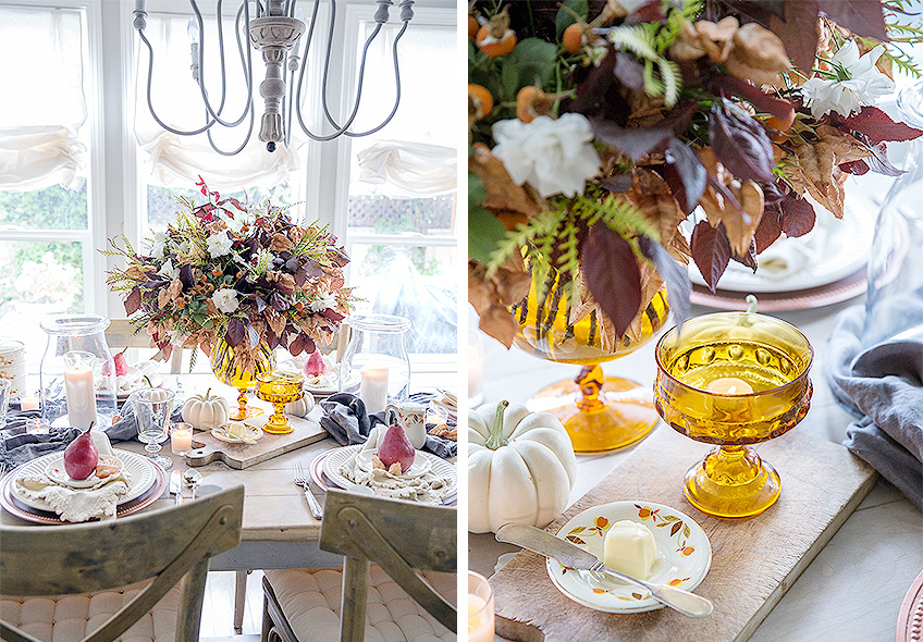 Mesa decorada con un ramo de flores y varios platos dispuestos elegantemente.